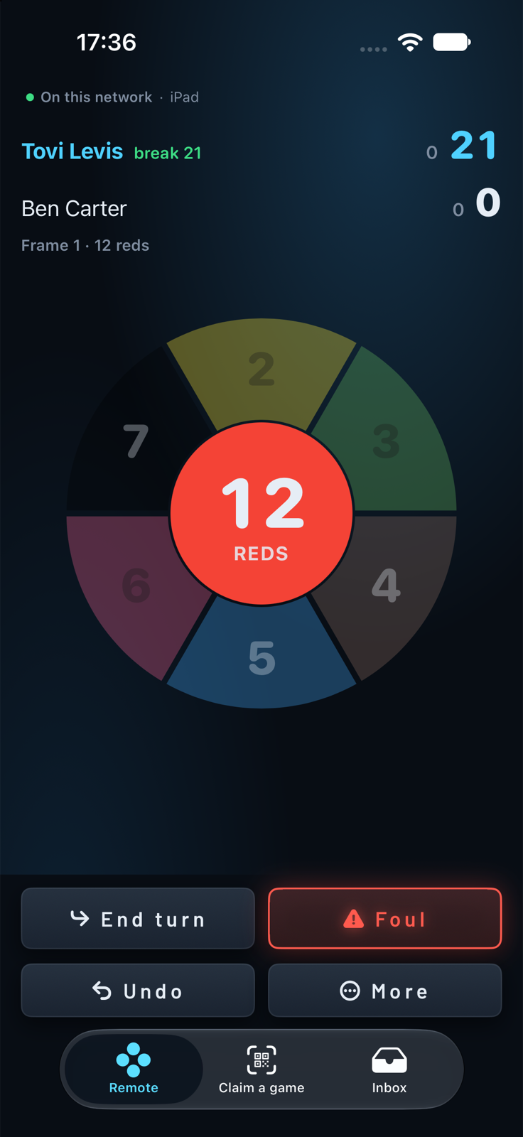 The SnooCare remote on iPhone: both players' scores, the break, and the ball wheel with the reds count in the middle.